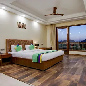 Treebo Nearmi Bell House Hotel
